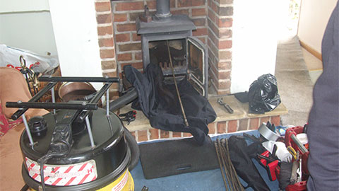 Large pile of soot removed from chimney after sweeping